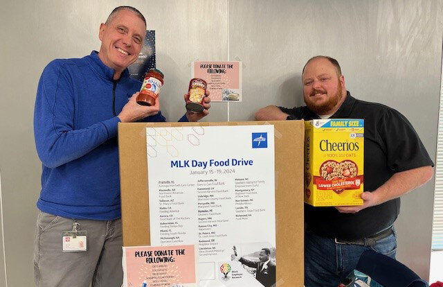 Gerald Brown (l.) and Timothy Hughes participated in Medline’s Montgomery MLK Day Food Drive.